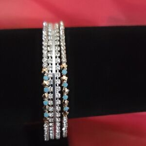 Elegant Boutique Stack with Silver Rhinestones and Gold with Blue Accents